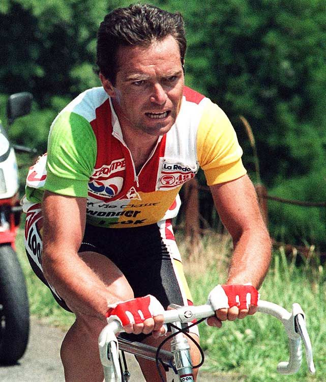 Bernard Hinault racing in the multicoloured combination jersey for La Vie Claire